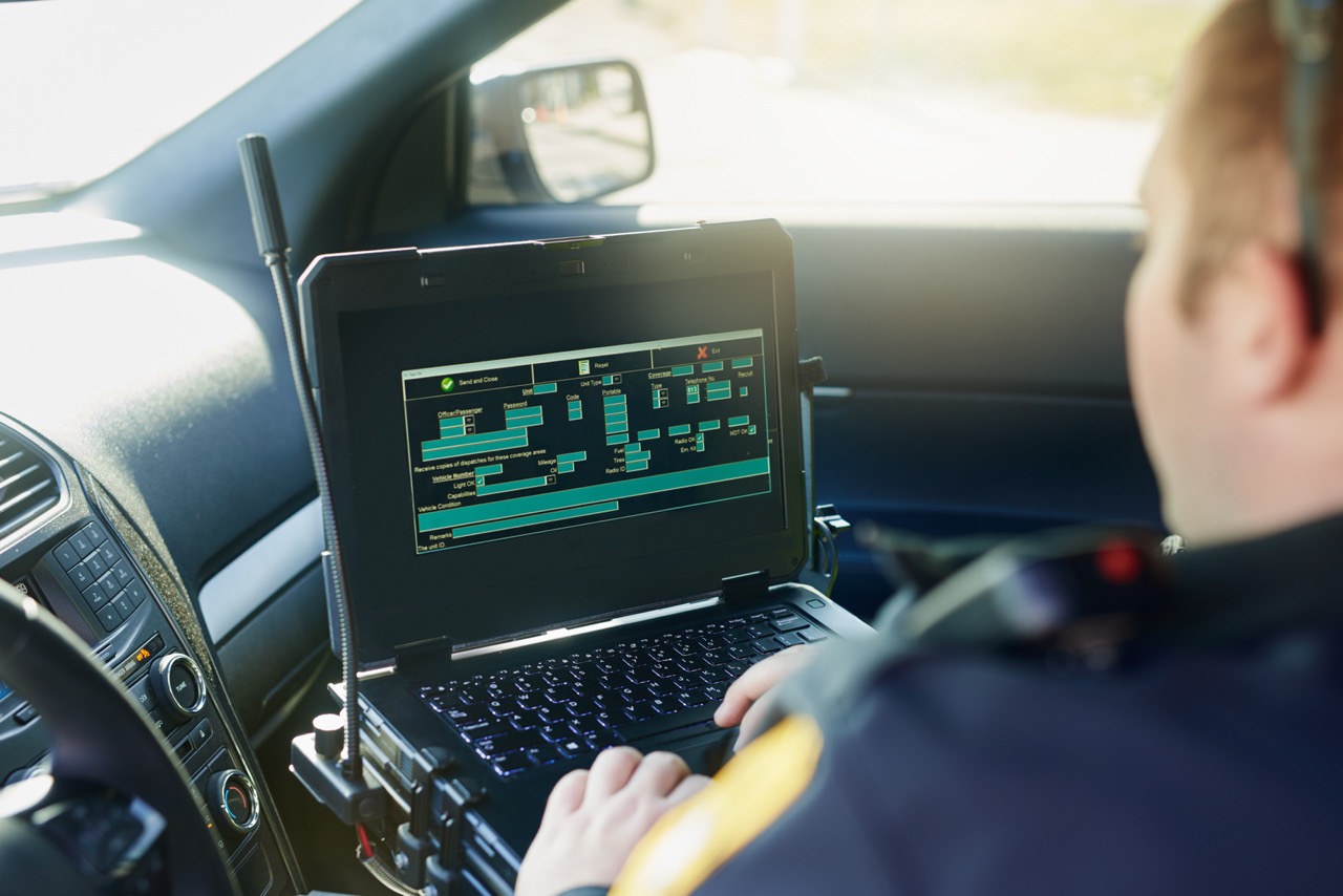 First responder working in emergency vehicle